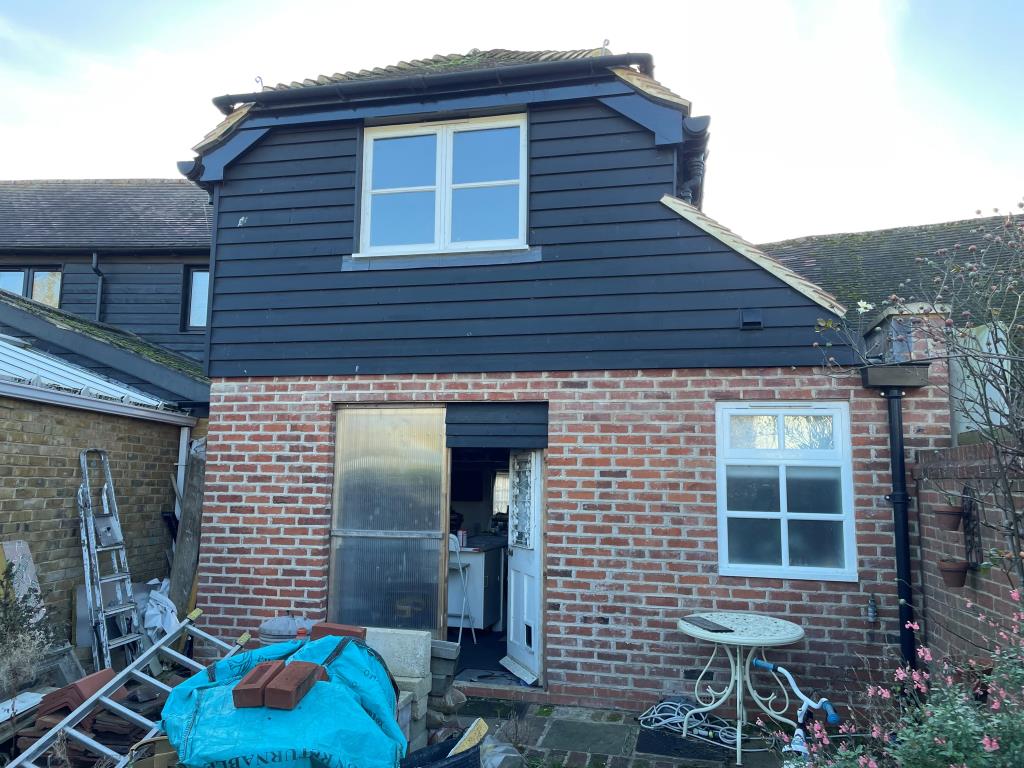 Lot: 55 - PERIOD COTTAGE FOR COMPLETION - Rear elevation. Brick and weather board.